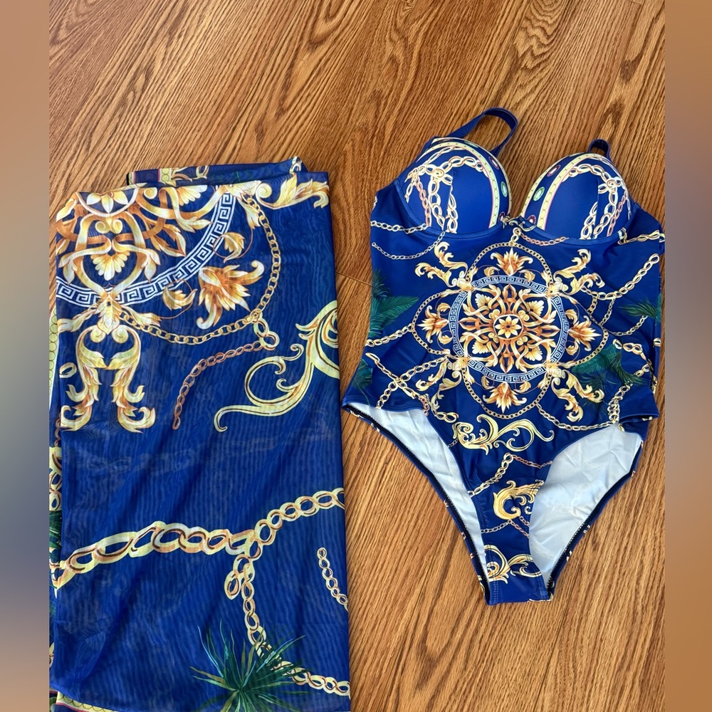 Woman’s New designer inspired one piece bathing suit with sarong size 12/Large